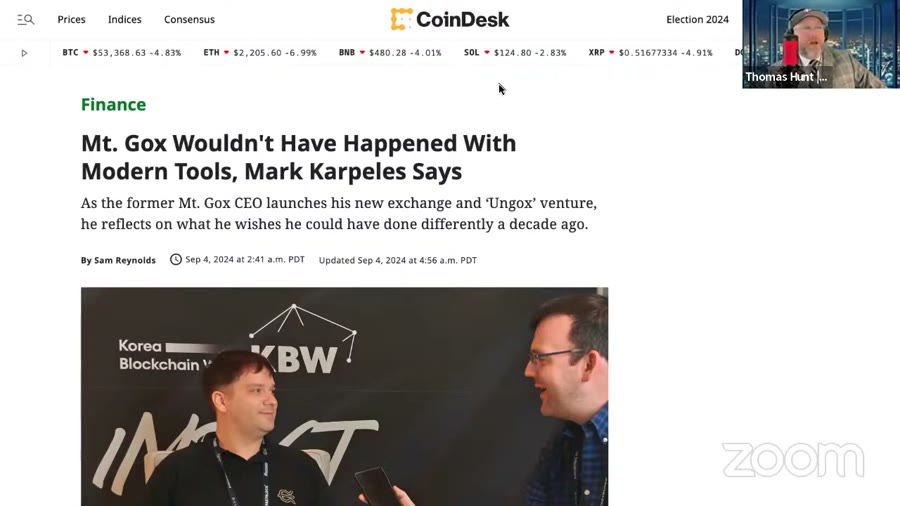 A screen recording of a news article about Mark Karpeles launching a new venture, shown during a panel broadcast.
